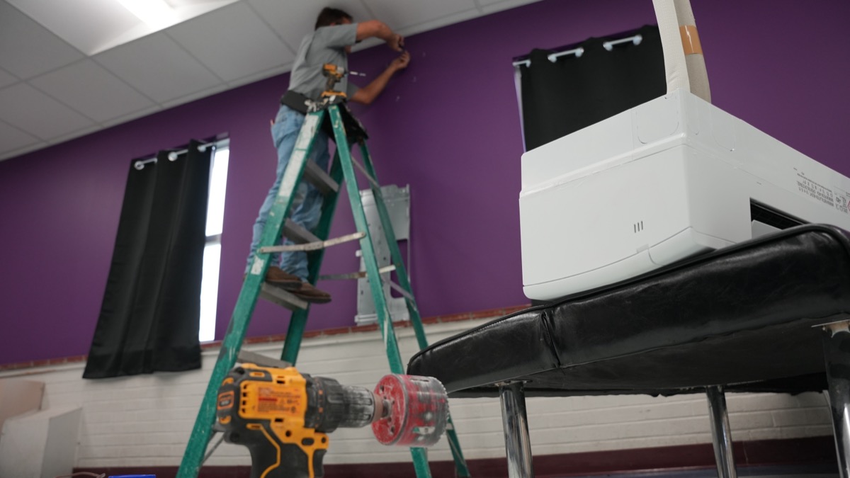 Delta Cooling installing indoor HVAC unit for air quality in North Louisiana